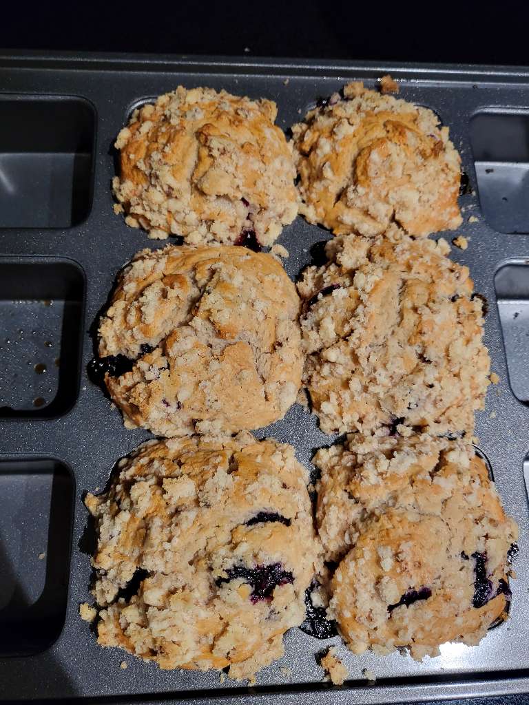 Six square muffins in a baking tin