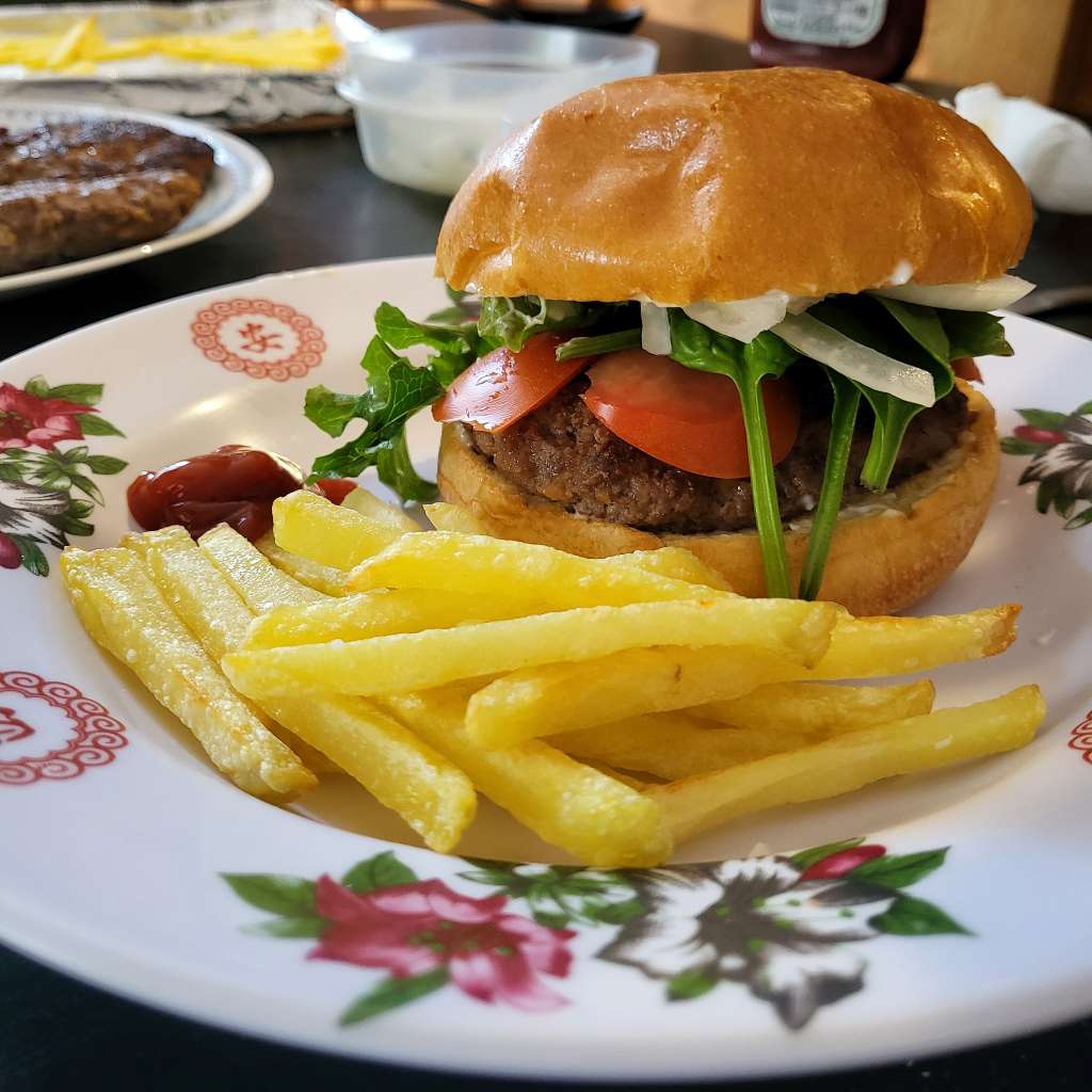 A side view of the (closed) burger and fries