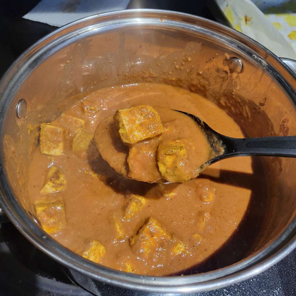 Some cooked butter tofu in a pot