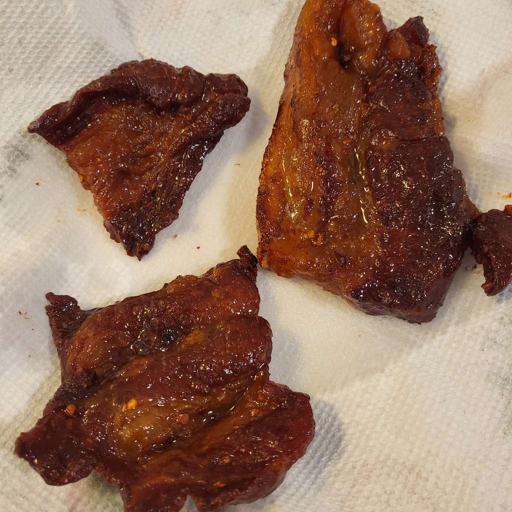 Three pieces of cured meat that's been deep fried