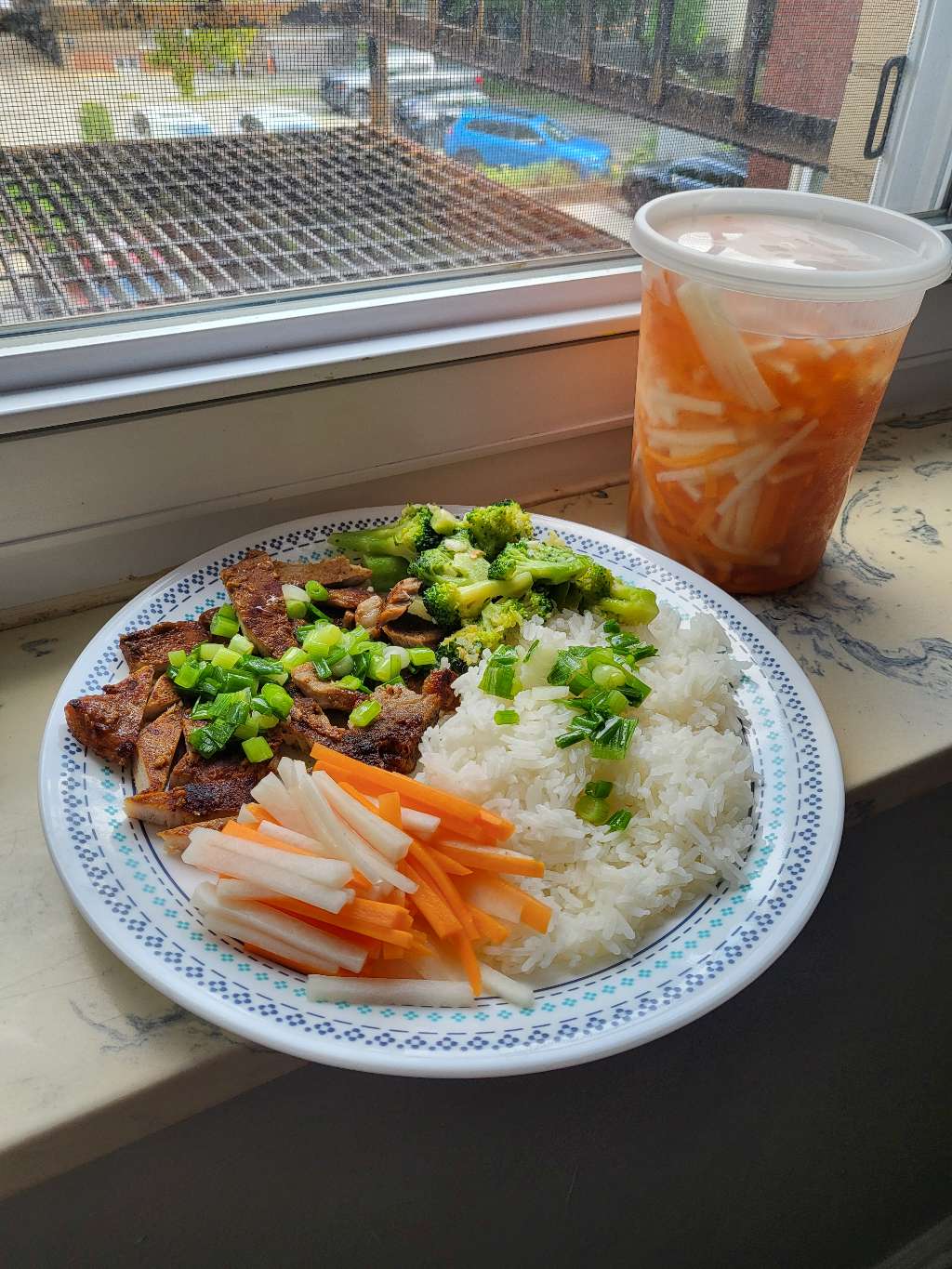 More pork chops with pickled veggies, sitting on the windowsill