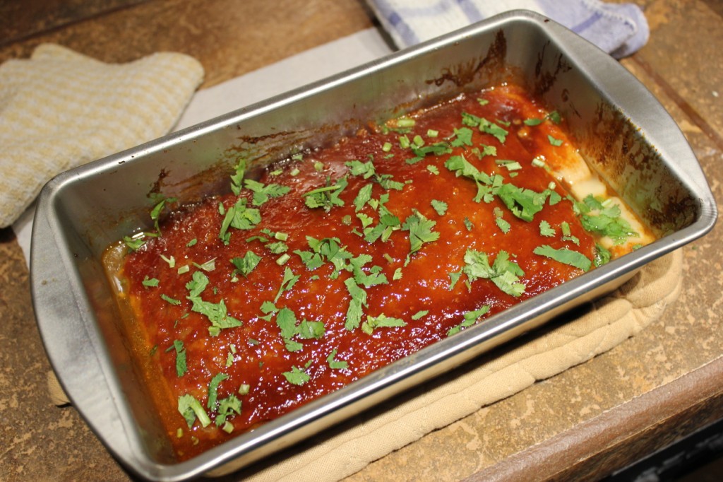 Meatloaf garnished with cilantro